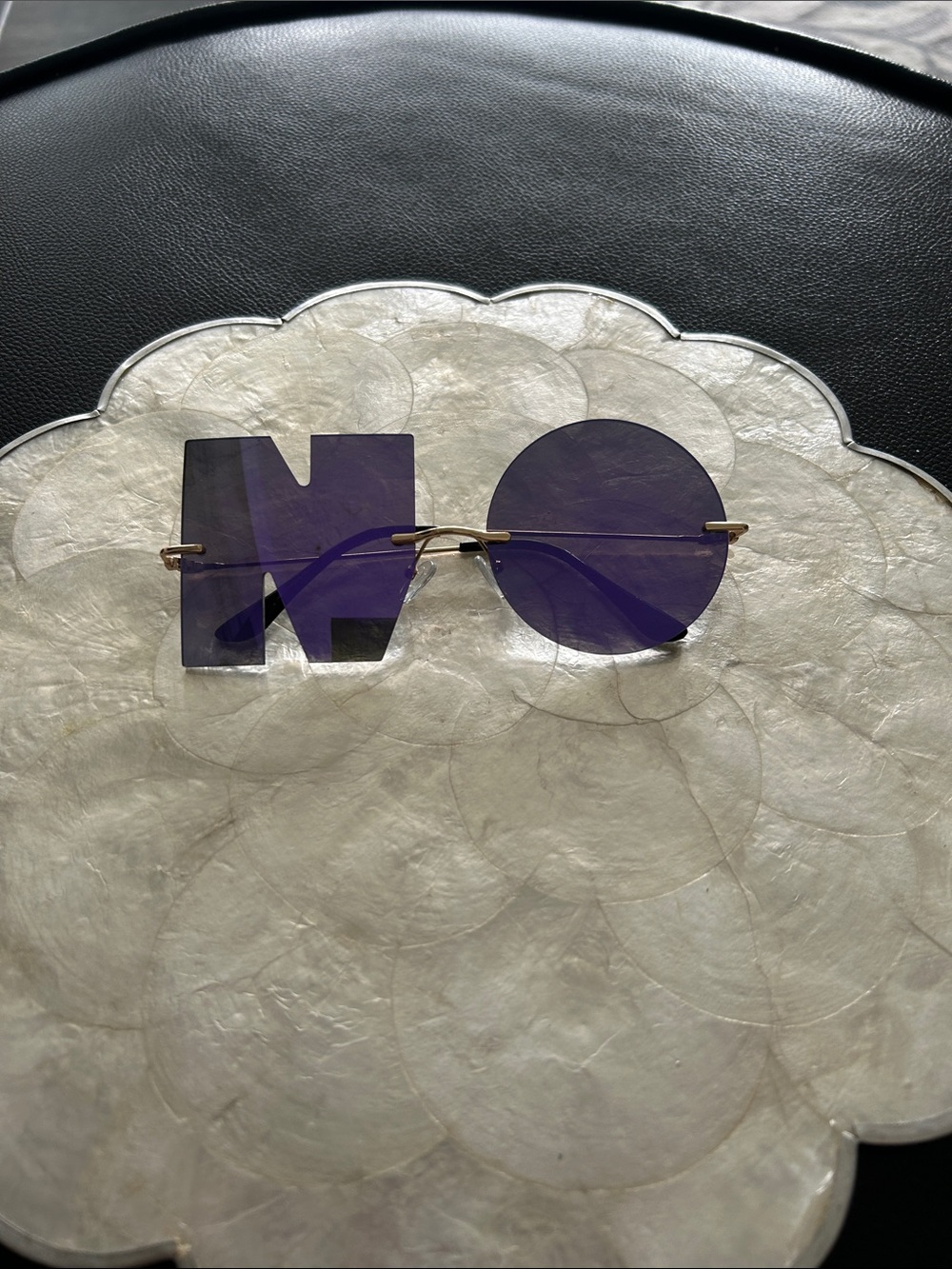 Novelty 'NO' Rimless Sunglasses - Purple Lenses